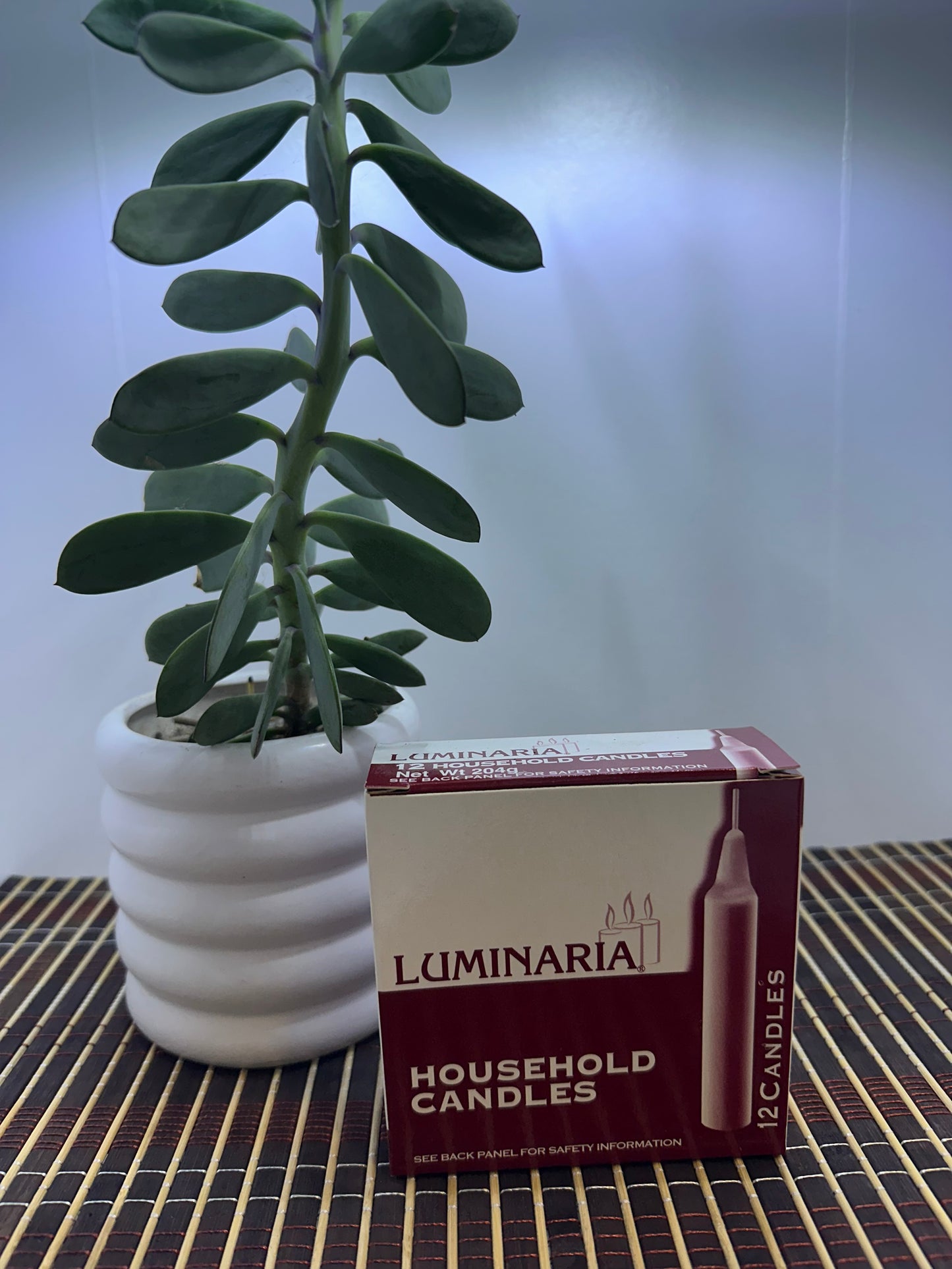 Caja de velas blancas