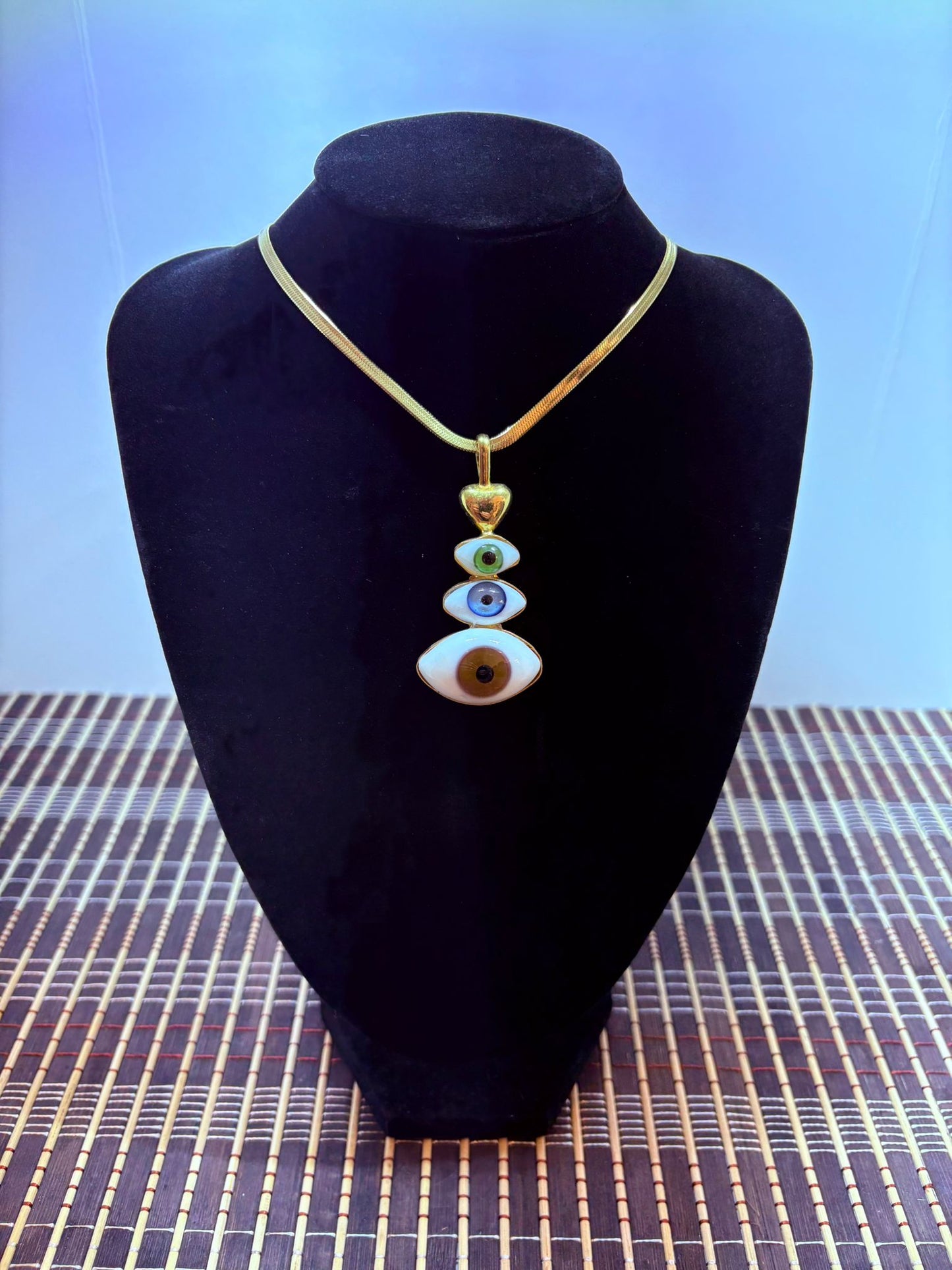 Dije triple ojo